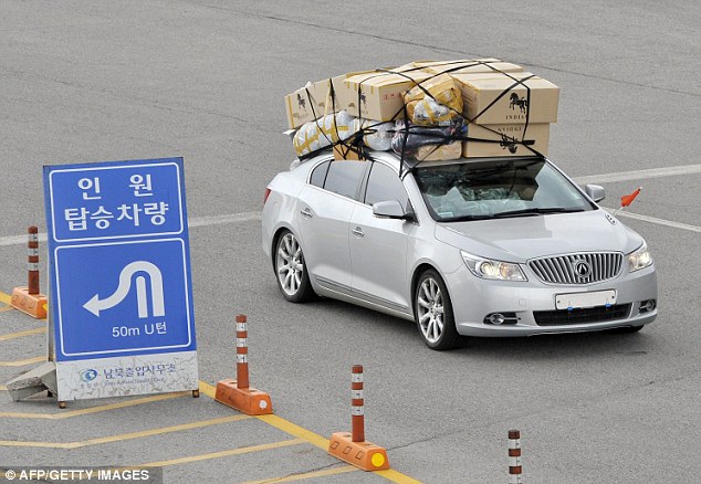 Escape: A car loaded with boxes arrives in South Korea from the Kaesong joint industrial complex
