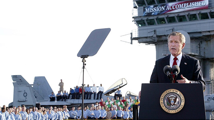 US President George W. Bush addresses the nation aboard the nuclear aircraft carrier USS Abraham Lincoln 01 May, 2003. Bush declared major fighting over in Iraq, calling it "one victory in a war on terror" which he said would continue until terrorists are defeated.  (AFP Photo/Stephen Jaffe)