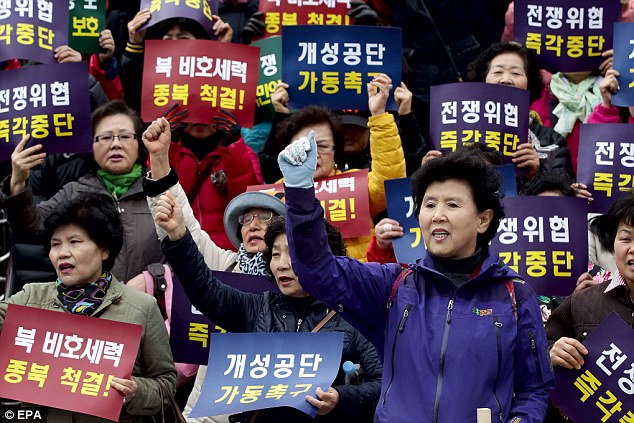 Crisis: Members of the Korea Freedom Federation were also protesting against North Korea's warmongering