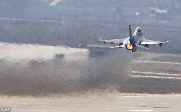 Staying sharp: A U.S. Air Force F-16 fighter jet takes off from a runway during a military exercise at the Osan U.S. Air Base in Osan, South Korea
