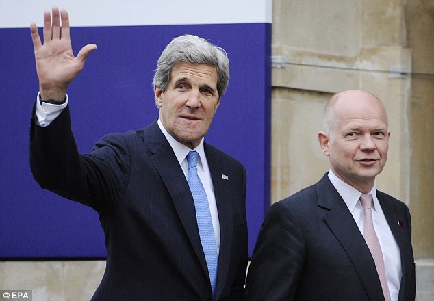 Urgent talks: British Foreign Secretary William Hague (right) walks with U.S. Secretary of State John Kerry ahead of a G8 meeting which will focus on the developing crisis in North Korea
